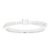 White diamond sterling silver ring with accent gemstones, showcasing elegant design and brilliant sparkle.